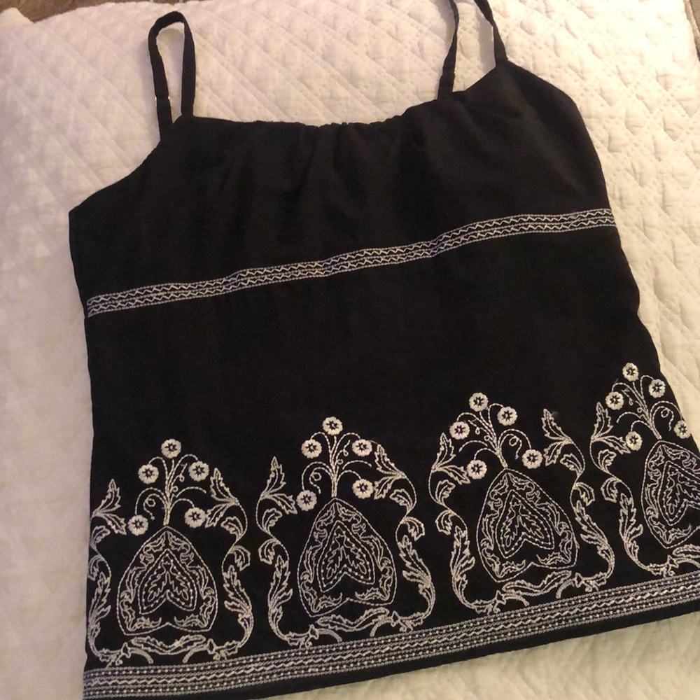 Sleeveless black and white halter top.